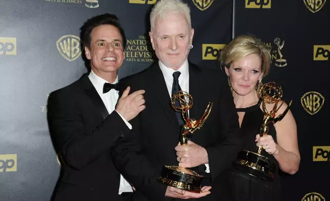 FILE - Christian Jules Le Blanc, left, poses with Anthony Geary and Maura West, right, winners of the awards for outstanding lead actor and actress in a drama series for "General Hospital", at the 42nd annual Daytime Emmy Awards at Warner Bros. Studios, April 26, 2015, in Burbank, Calif. (Photo by Richard Shotwell/Invision/AP, File)