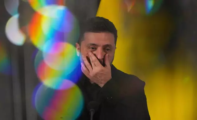 Ukraine's President Volodymyr Zelenskyy attends a news conference after meeting Dutch Prime Minister Dick Schoof in The Hague, Netherlands, Tuesday, Dec. 16, 2025. (AP Photo/Peter Dejong)