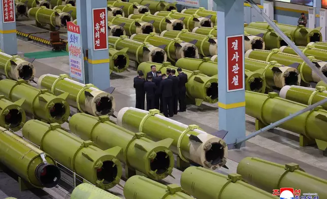 In this undated photo provided Friday, Dec. 26, 2025, by the North Korean government, its leader Kim Jong Un inspects missile and shell production at a factory in an undisclosed location, North Korea. Independent journalists were not given access to cover the event depicted in this image distributed by the North Korean government. The content of this image is as provided and cannot be independently verified. Korean language watermark on image as provided by source reads: "KCNA" which is the abbreviation for Korean Central News Agency. (Korean Central News Agency/Korea News Service via AP)