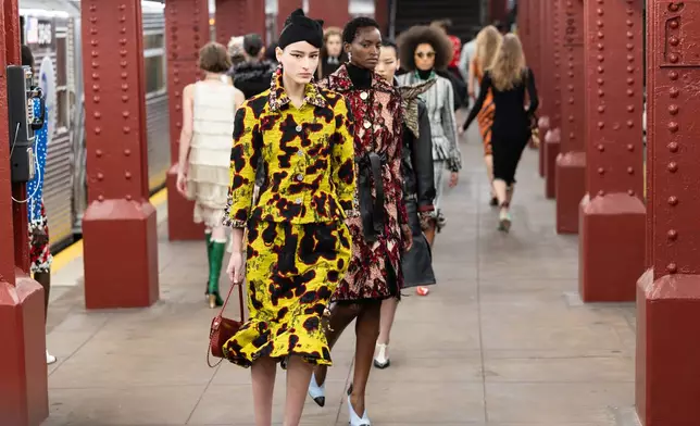 Models walk the runway during the CHANEL 2025/26 Métiers d'art fashion show at Bowery subway station on Tuesday, Dec. 2, 2025, in New York. (Photo by CJ Rivera/Invision/AP)