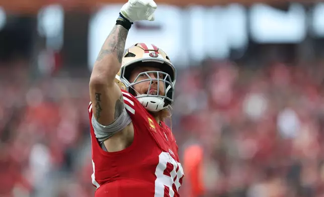 San Francisco 49ers tight end George Kittle (85) celebrates a first down catch during the first half of an NFL football game against the Tennessee Titans, Sunday, Dec. 14, 2025, in Santa Clara, Calif. (AP Photo/Jed Jacobsohn)