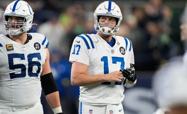 Indianapolis Colts quarterback Philip Rivers (17) reacts after throwing an interception during the second half of an NFL football game against the Seattle Seahawks, Sunday, Dec. 14, 2025, in Seattle. (AP Photo/Stephen Brashear)