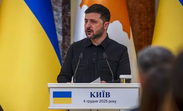 Ukrainian President Volodymyr Zelenskyy attends a joint news conference with Cyprus' President Nikos Christodoulides in Kyiv, Ukraine, Thursday, Dec. 4, 2025. (AP Photo/Dan Bashakov)