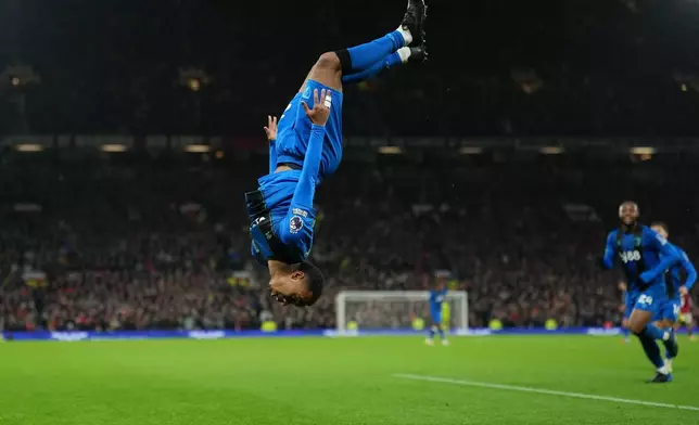 Bournemouth's Eli Junior Kroupicelebrates after scoring during a Premier League soccer match between Manchester United and Bournemouth in Manchester, England, Monday, Dec. 15, 2025. (AP Photo/Jon Super)