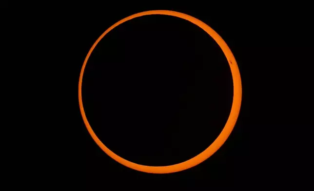 FILE - The moon moves across the sun during a "ring of fire" annular solar eclipse seen from Tahai, Rapa Nui (Easter Island), Chile, on Wednesday, Oct. 2, 2024. (AP Photo/Esteban Felix, File)
