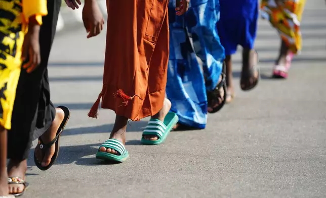 Freed students of St. Mary's Catholic School in the Papiri community upon their arrival at the government house, in Minna, Nigeria, Monday, Dec. 22, 2025. (AP Photo/Sunday Alamba)