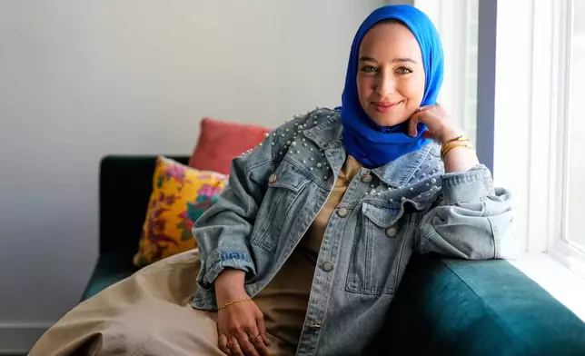 FILE - Hoda Abrahim, founder and CEO of, "Love, Inshallah," a matchmaker featured on the series, "Muslim Matchmaker," on Hulu, appears in her home on Aug. 11, 2025, in Conroe, Texas. (AP Photo/Ashley Landis, File)