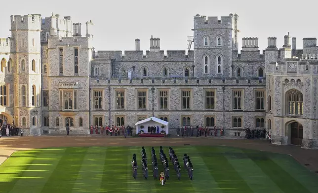 A view of the ceremonial welcome for German President Frank-Walter Steinmeier and his wife Elke Büdenbender at Windsor Castle, in Windsor, England, Wednesday, Dec. 3, 2025. (Carl Court/Pool Photo via AP)
