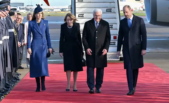 Germany's President Frank-Walter Steinmeier and his wife Elke Büdenbender, centre, are welcomed by Britain's Catherine, Princess of Wales, and Britain's Prince William, right, at Heathrow Airport in London, Wednesday, Dec. 3, 2025 (Jeff Spicer/Pool Photo via AP)