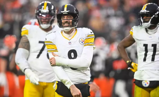 Pittsburgh Steelers quarterback Aaron Rodgers (8) reacts after a play during the second half of an NFL football game against the Cleveland Browns, Sunday, Dec. 28, 2025, in Cleveland. (AP Photo/David Richard)