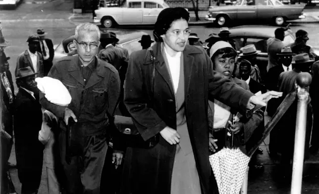 FILE - Rosa Parks arrives at circuit court to be arraigned in the racial bus boycott in Montgomery, Ala., Feb. 24, 1956. (AP Photo, File)
