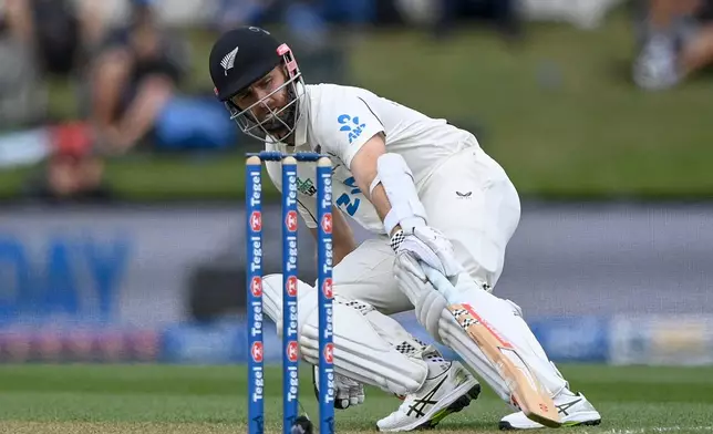New Zealand's Kane Williamson makes runs agains the West Indies during their cricket test match in Christchurch, New Zealand, Tuesday, Dec. 2, 2025. (John Davidson/Photosport via AP)