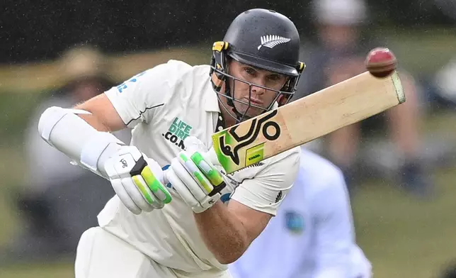 New Zealand's Tom Latham bats against the West Indies during their cricket test match in Christchurch, New Zealand, Tuesday, Dec. 2, 2025. (John Davidson/Photosport via AP)
