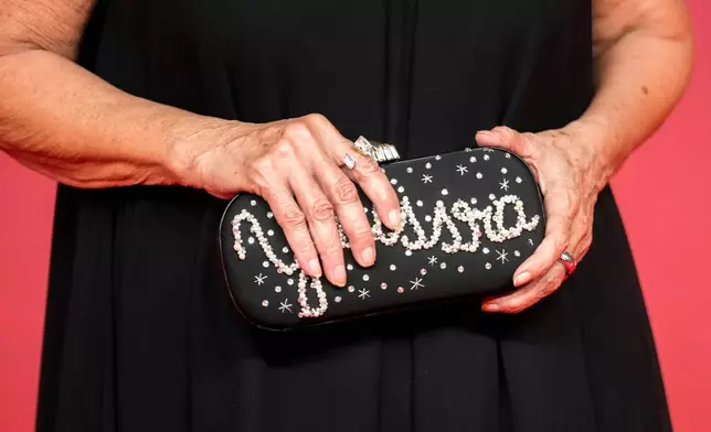 Egyptian actress Youssra poses for a photo on the red carpet during the 22nd Marrakech Film Festival, in Morocco, Tuesday, Dec. 2, 2025. (AP Photo/Mosa'ab Elshamy)