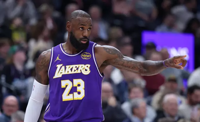Los Angeles Lakers forward Lebron James reacts after a play against the Utah Jazz during the first quarter of an NBA basketball game, Thursday, Dec. 18, 2025, in Salt Lake City. (AP Photo/Rob Gray)