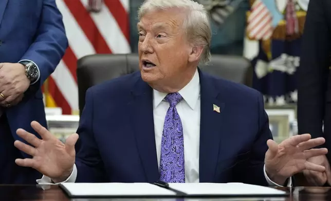 President Donald Trump gestures during a signing ceremony on an AI initiative in the Oval Office of the White House, Thursday, Dec. 11, 2025, in Washington. (AP Photo/Alex Brandon)