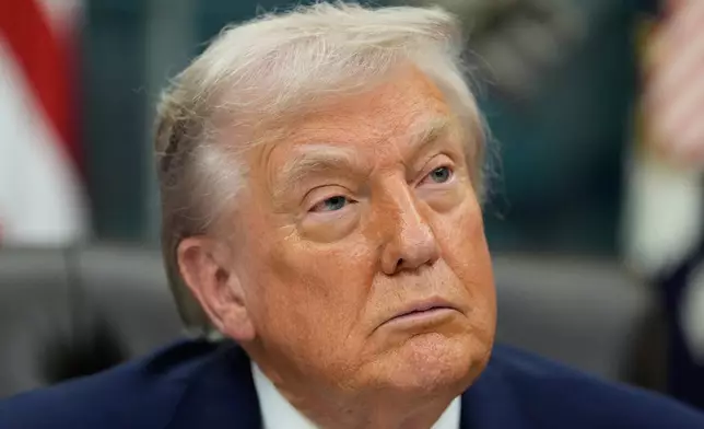President Donald Trump speaks during a signing ceremony in the Oval Office of the White House, Thursday, Dec. 11, 2025, in Washington. (AP Photo/Alex Brandon)