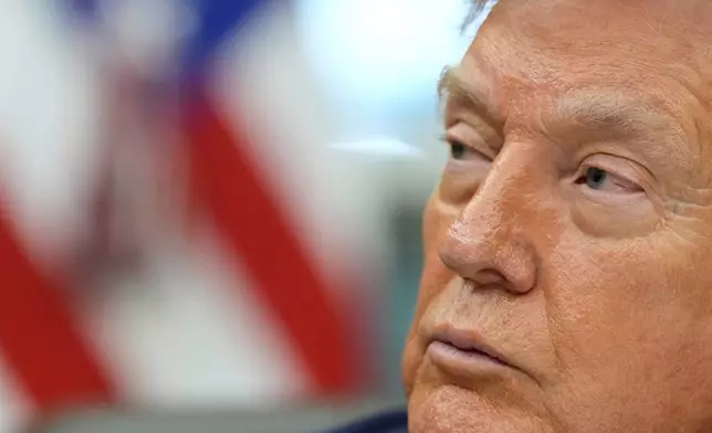President Donald Trump speaks during a signing ceremony in the Oval Office of the White House, Thursday, Dec. 11, 2025, in Washington. (AP Photo/Alex Brandon)