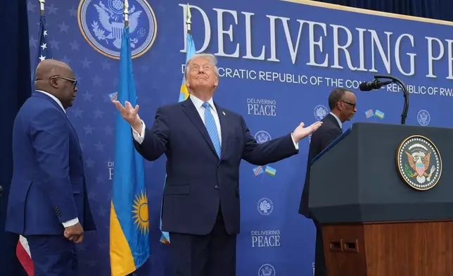 President Donald Trump arrives for a signing ceremony with Rwanda's President Paul Kagame and Democratic Republic of Congo President Felix-Antoine Tshisekedi at the U.S. Institute of Peace, Thursday, Dec. 4, 2025, in Washington. (AP Photo/Evan Vucci)