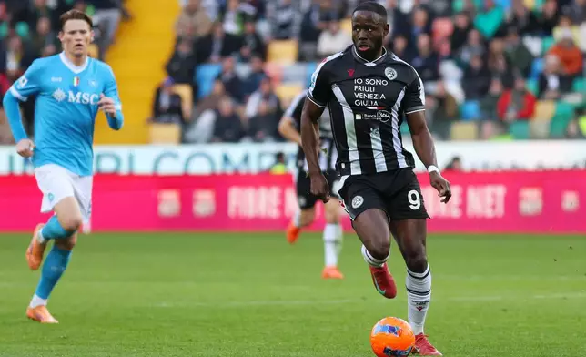 Udinese's Keinan Davis controls a ball, during the Serie A soccer match between Udinese and Napoli, in Udine, north east Italy, Sunday, Dec. 14,2025. (Andrea Bressanutti/LaPresse via AP)
