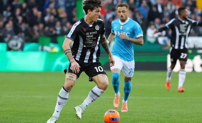 Udinese's Nicolo Zaniolo controls a ball, during the Serie A soccer match between Udinese and Napoli, in Udine, north east Italy, Sunday, Dec. 14,2025. (Andrea Bressanutti/LaPresse via AP)