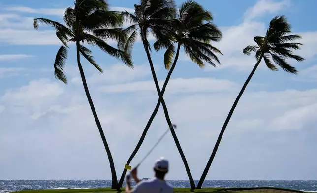 Andrew Putnam hits on the 16th hole during the final round of the Sony Open golf event, Jan. 12, 2025, at Waialae Country Club in Honolulu. (AP Photo/Matt York, File)