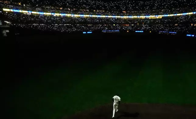 Milwaukee Brewers' Abner Uribe enters the game during the ninth inning of Game 2 of baseball's National League Division Series against the Chicago Cubs, Oct. 6, 2025, in Milwaukee. (AP Photo/Morry Gash, File)