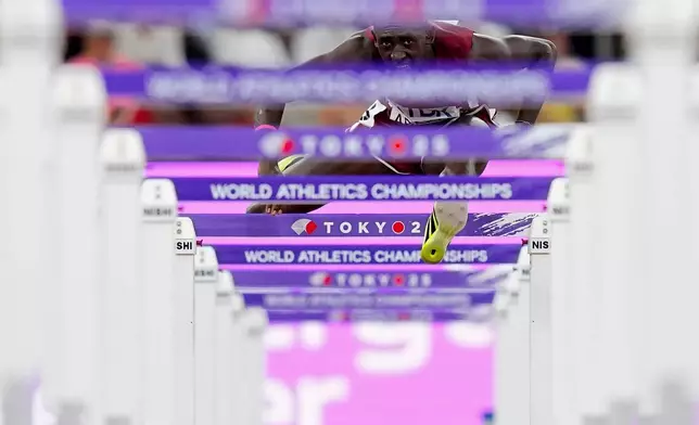 Qatar's Oumar Doudai Abakar competes in a men's 110 meters hurdles heat at the World Athletics Championships in Tokyo, Sept. 15, 2025. (AP Photo/Petr David Josek, File)