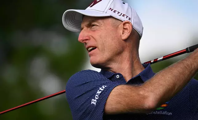 Jim Furyk watches his tee shot on the second hole during the final round of the PNC Championship golf tournament, Sunday, Dec. 21, 2025, in Orlando, Fla. (AP Photo/Phelan M. Ebenhack)