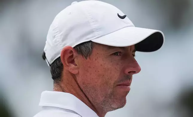 Rory McIlroy of Northern Ireland reacts during the first round of the Australian Open golf tournament in Melbourne, Australia, Thursday, Dec. 4, 2025. (AP Photo/Asanka Brendon Ratnayake)