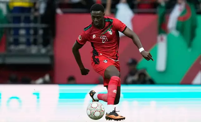 Sudan's Abo Eisa controls the ball during the Africa Cup of Nations group E soccer match between Algeria and Sudan in Rabat, Morocco, Wednesday, Dec. 24, 2025. (AP Photo/Mosa'ab Elshamy)