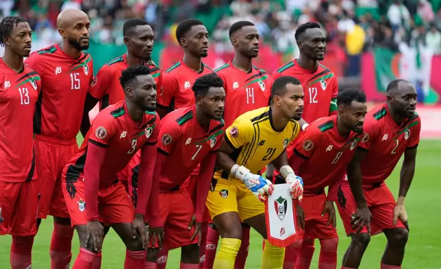 Sudan's players pose for the team picture before the Africa Cup of Nations group E soccer match between Algeria and Sudan in Rabat, Morocco, Wednesday, Dec. 24, 2025. (AP Photo/Mosa'ab Elshamy)