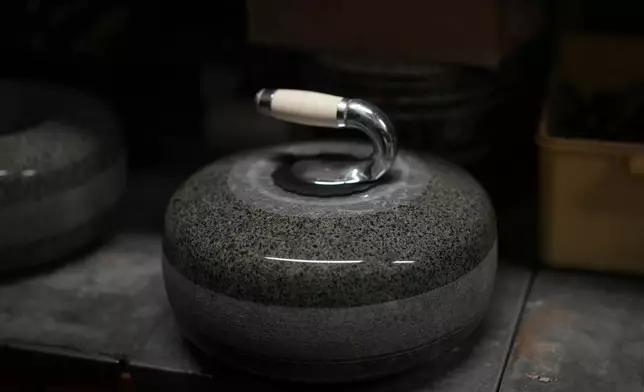 A finished curling stone in a store room at Kays Curling stone factory in Mauchline, Scotland, Tuesday, Nov. 11, 2025. (AP Photo/Alastair Grant)
