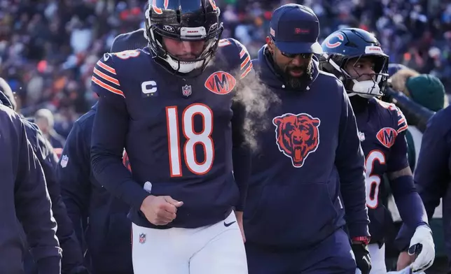 Chicago Bears quarterback Caleb Williams walks off the field at halftime of an NFL football game against the Cleveland Browns in Chicago, Sunday, Dec. 14, 2025. (AP Photo/Nam Y. Huh)