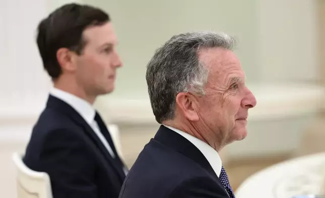 U.S. special envoy Steve Witkoff, foreground, and Jared Kushner, U.S. President Donald Trump's son-in-law, attend the talks with Russian President Vladimir Putin at the Senate Palace of the Kremlin in Moscow, Russia, Tuesday, Dec. 2, 2025. (Alexander Kazakov, Sputnik, Kremlin Pool Photo via AP)