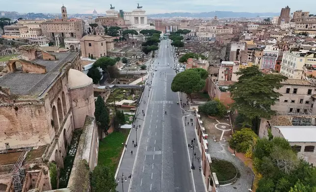 An aerial view of the Roman Forum, left, and Rome's city center, Thursday, Dec. 4, 2025. (AP Photo/Andrew Medichini)