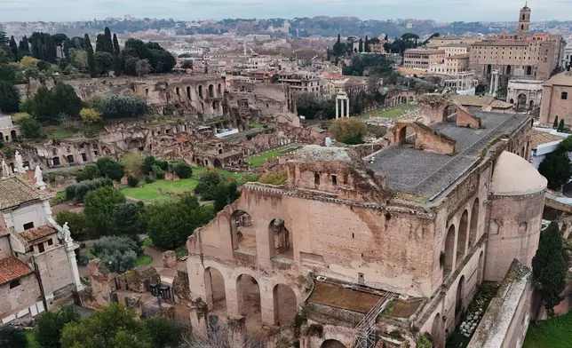 An aerial view of the Roman Forum, in Rome, Thursday, Dec. 4, 2025. (AP Photo/Andrew Medichini)