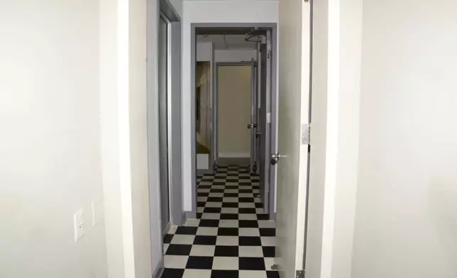 This photo released by the U.S. Department of Justice shows a hallway during a search of Jeffrey Epstein's home on July 6, 2019, in New York. (U.S. Department of Justice via AP)