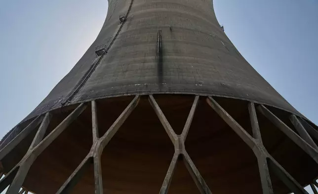 FILE - The base of a cooling tower at Constellation's nuclear power plant stands on Three Mile Island near Middletown, Pa., June 25, 2025. (AP Photo/Stephanie Scarbrough, File)