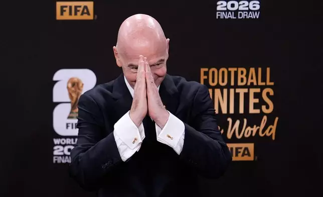 FIFA President Gianni Infantino arrives to attend the draw for the 2026 soccer World Cup at the Kennedy Center in Washington, Friday, Dec. 5, 2025. (AP Photo/Julia Demaree Nikhinson)