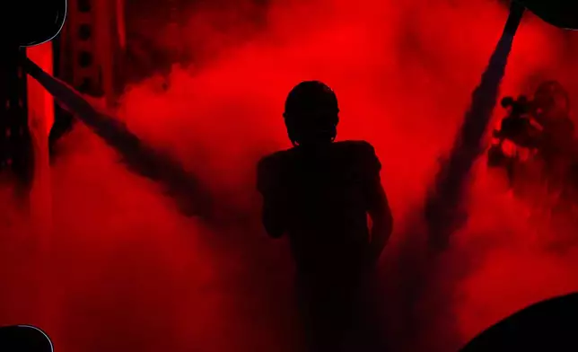Kansas City Chiefs quarterback Patrick Mahomes is introduced before an NFL football game against the Houston Texans Sunday, Dec. 7, 2025, in Kansas City, Mo. (AP Photo/Charlie Riedel)