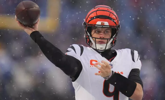 Cincinnati Bengals quarterback Joe Burrow throws a pass during warmups before an NFL football game against the Buffalo Bills, Sunday, Dec. 7, 2025, in Orchard Park, N.Y. (AP Photo/Gene J. Puskar)