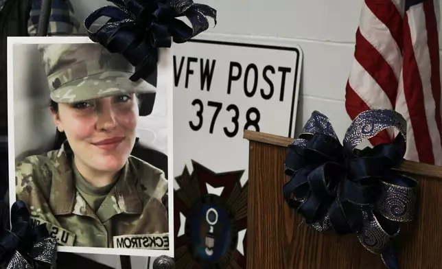 A photo of National Guard member Specialist Sarah Beckstrom is displayed at a vigil held in her honor in Webster Springs, W.Va., Friday, Nov. 28, 2025. (Rachel Isabell/The Daily Times via AP)