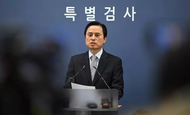 South Korean independent counsel Cho Eun-seok speaks as he announces the results of its investigation into insurrection charges related to former President Yoon Suk Yeol at the Seoul High Prosecutors' Office in Seoul Monday, Dec. 15, 2025. (Jung Yeon-je/Pool Photo via AP)
