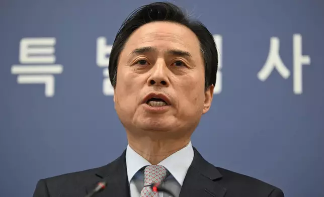 South Korean independent counsel Cho Eun-seok speaks as he announces the results of its investigation into insurrection charges related to former President Yoon Suk Yeol at the Seoul High Prosecutors' Office in Seoul Monday, Dec. 15, 2025. (Jung Yeon-je/Pool Photo via AP)