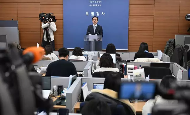 South Korean independent counsel Cho Eun-seok speaks as he announces the results of its investigation into insurrection charges related to former President Yoon Suk Yeol at the Seoul High Prosecutors' Office in Seoul Monday, Dec. 15, 2025. (Jung Yeon-je/Pool Photo via AP)