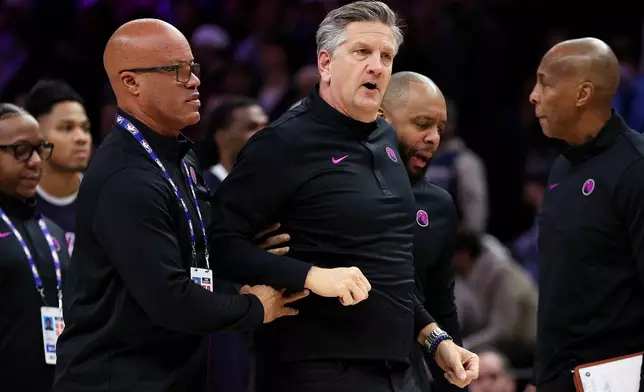 Minnesota Timberwolves head coach Chris Finch reacts after being ejected from during the first half of an NBA basketball game against the Oklahoma City Thunder, Friday, Dec. 19, 2025, in Minneapolis. (AP Photo/Matt Krohn)