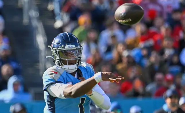 Tennessee Titans quarterback Cam Ward passes during the first half of an NFL football game against the Kansas City Chiefs, Sunday, Dec. 21, 2025, in Nashville, Tenn. (AP Photo/John Amis)