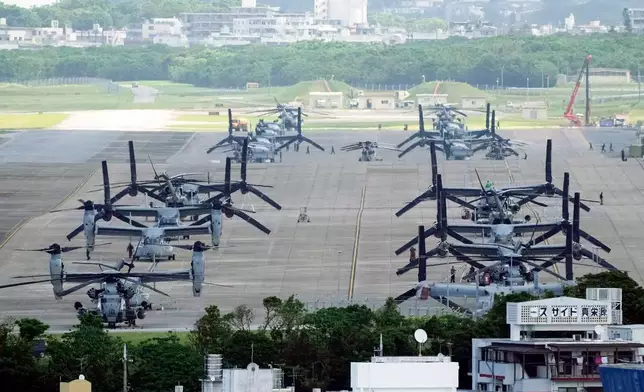 FILE - U.S. MV-22 Osprey transport aircraft are parked at the U.S. Marine Corps Air Station Futenma in Ginowan, south of Okinawa, southern Japan, Sept. 6, 2023. (AP Photo/Hiro Komae, File)
