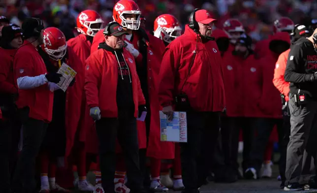 Kansas City Chiefs head coach Andy Reid watches from the sidelines during the first half of an NFL football game against the Los Angeles Chargers Sunday, Dec. 14, 2025, in Kansas City, Mo. (AP Photo/Ed Zurga)